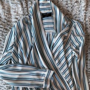 Blue and white pinstripe shawl collar wrap top